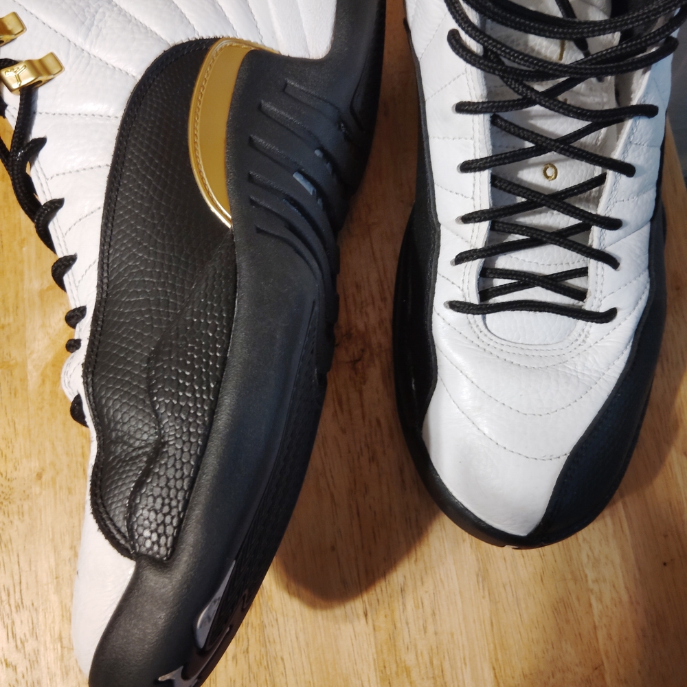 Jordan Black, White, and Gold Athletic Shoes
